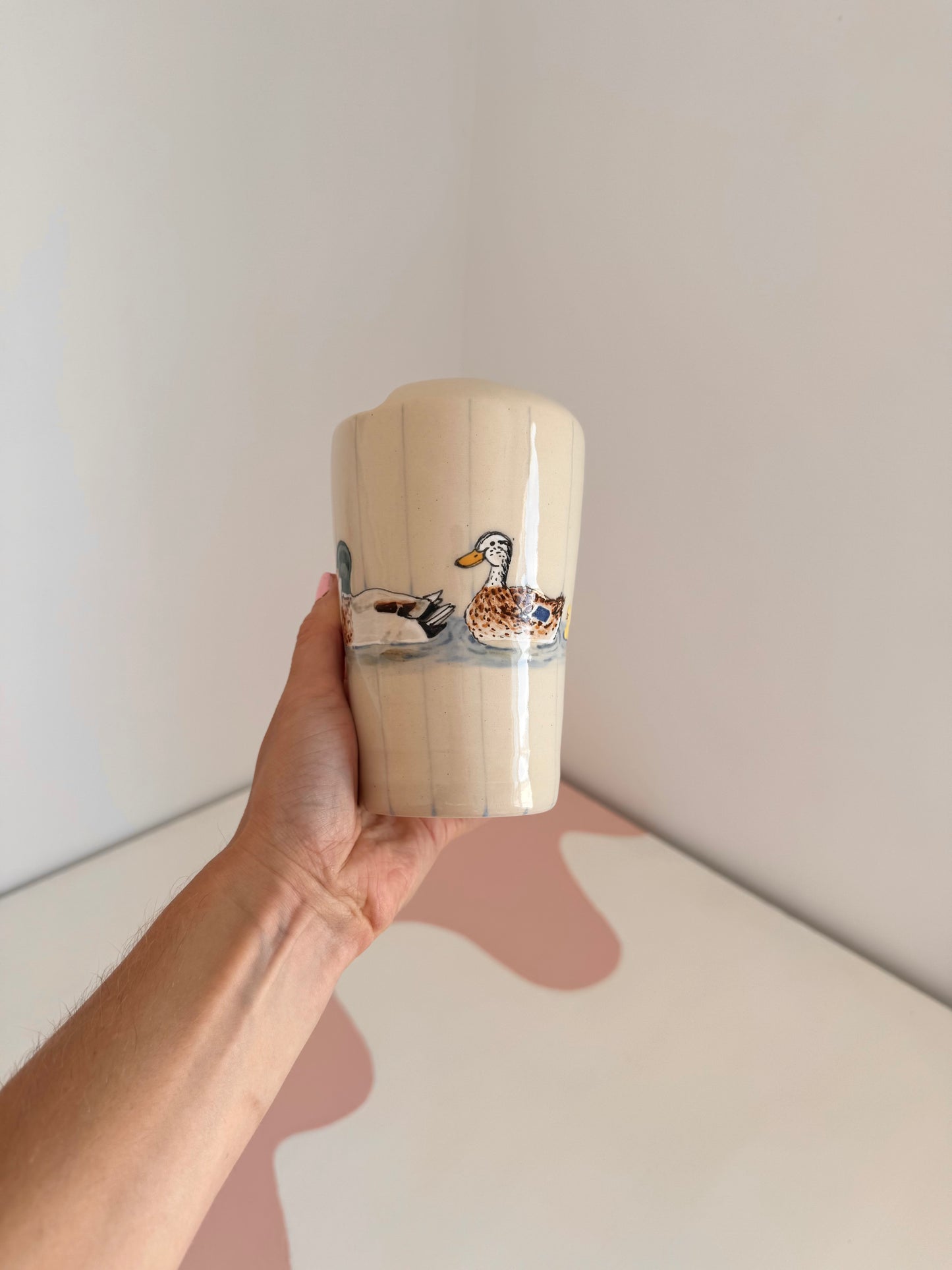Ducks in a Row To-Go Cup